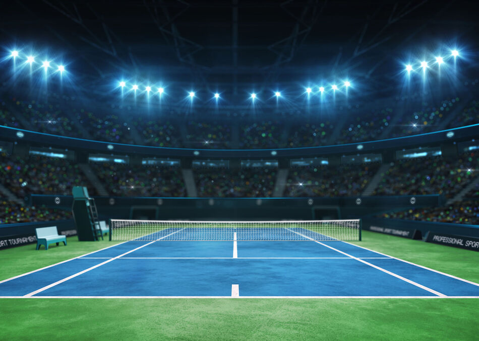 Blue tennis court and illuminated indoor arena with fans, upper front view, professional tennis sport